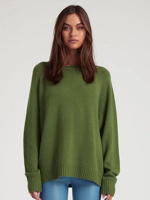 Solid color knit sweater with dark green crew neck