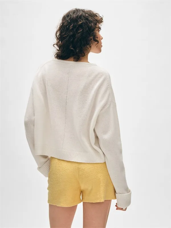 Beige and white solid color V-neck wool sweater